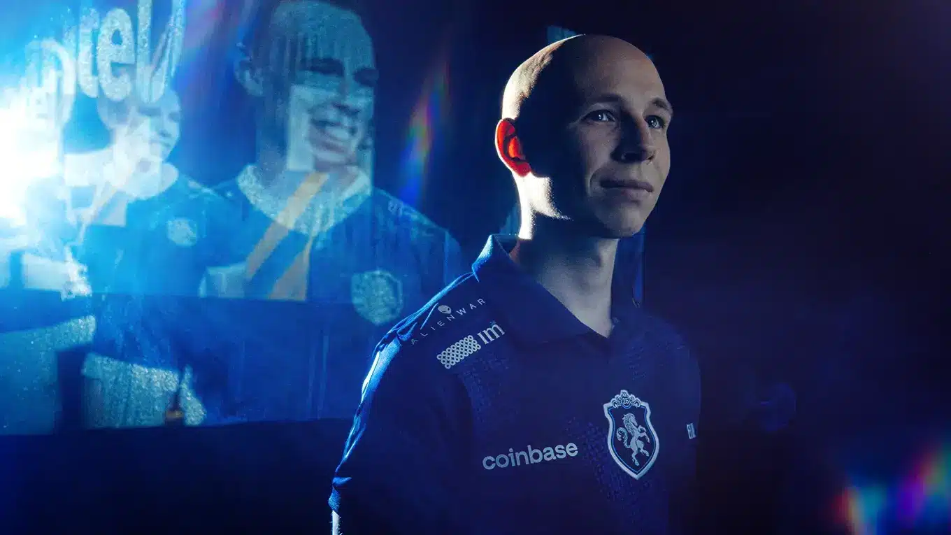 Portrait of professional CS2 player EliGE wearing a Team Liquid jersey with Coinbase and Alienware logos.