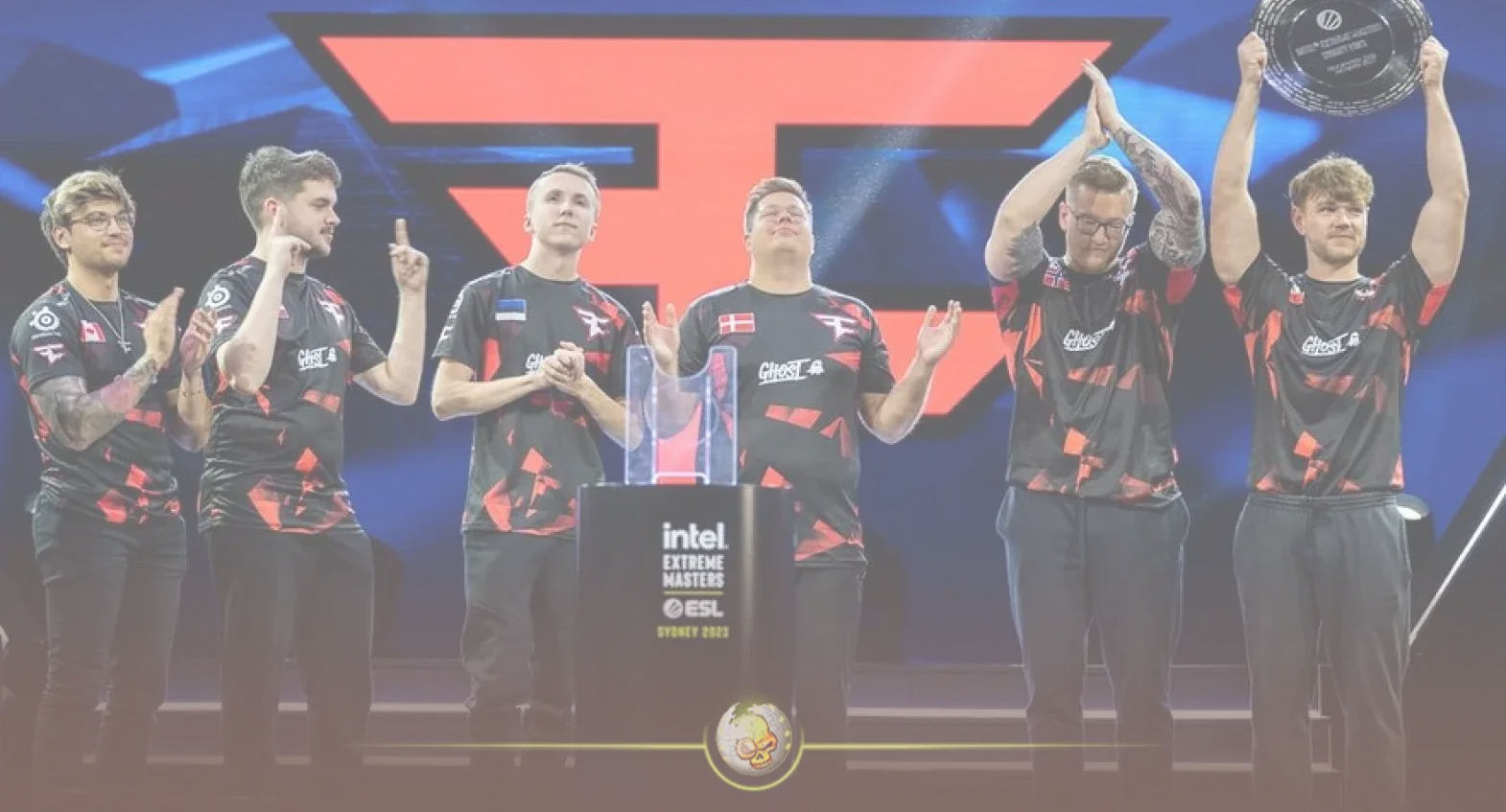 FaZe Clan CS2 team posing with the Intel Extreme Masters Sydney 2023 trophy