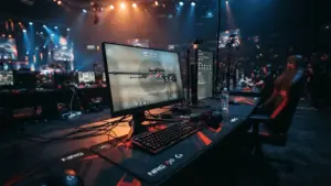 Empty esports gaming station with AWP rifle on screen, dramatic arena lighting, suggesting CS2 roster change