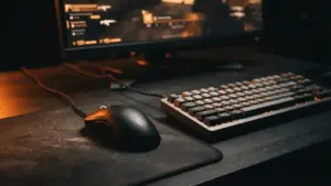 Gaming peripherals lit by orange light representing fnatic's new CS2 roster signing