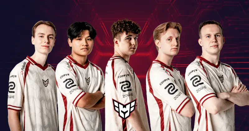 Five members of the HEROIC CS2 esports team posing in white and red team jerseys against a red background.